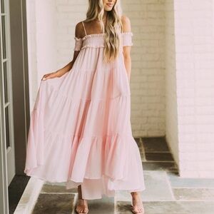 Light pink gingham print ruffled maxi dress.